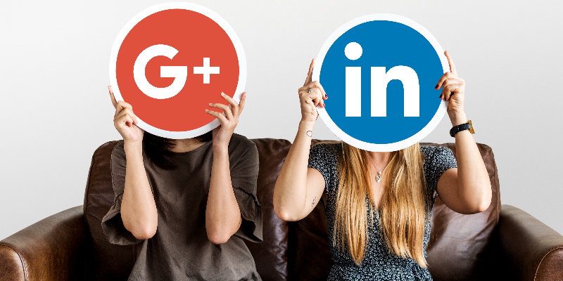 People holding icons of social and search platforms