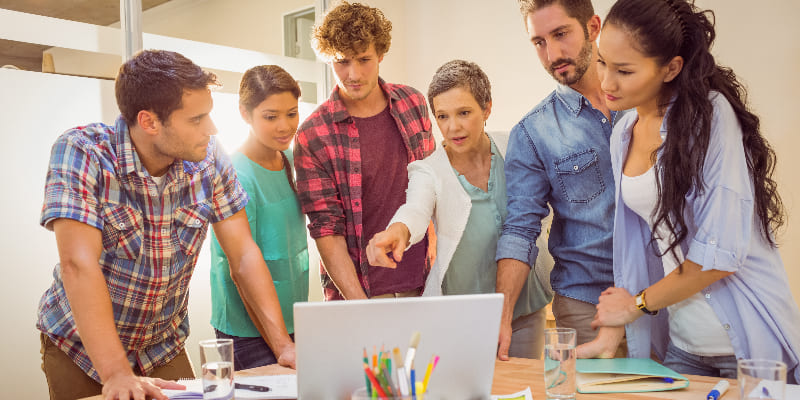 Marketing team collaborating on ad concepts